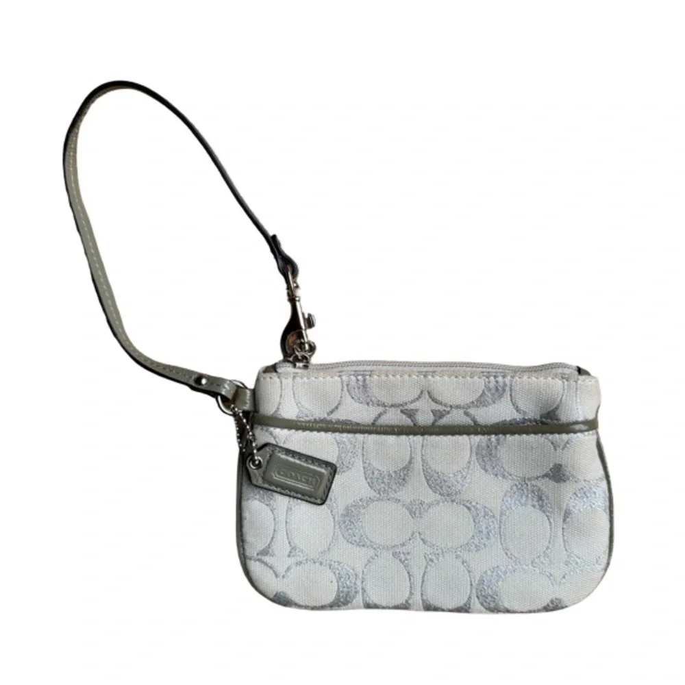 Coach White and Silver Signature Wristlet